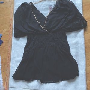 ladies short dress gold chain trim in front and back size large runs medium